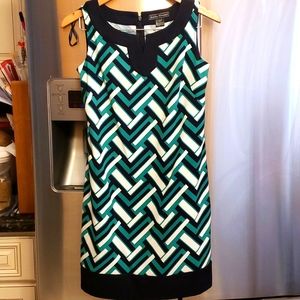 Sleeveless dress. Navy green and white herringbone pattern. Nwt